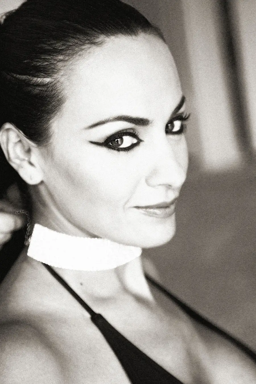 Illustrative stock portrait of a woman in dramatic black and white styling